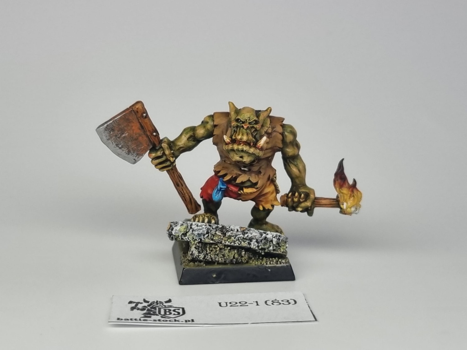 spellcrow orc with axe and torch
