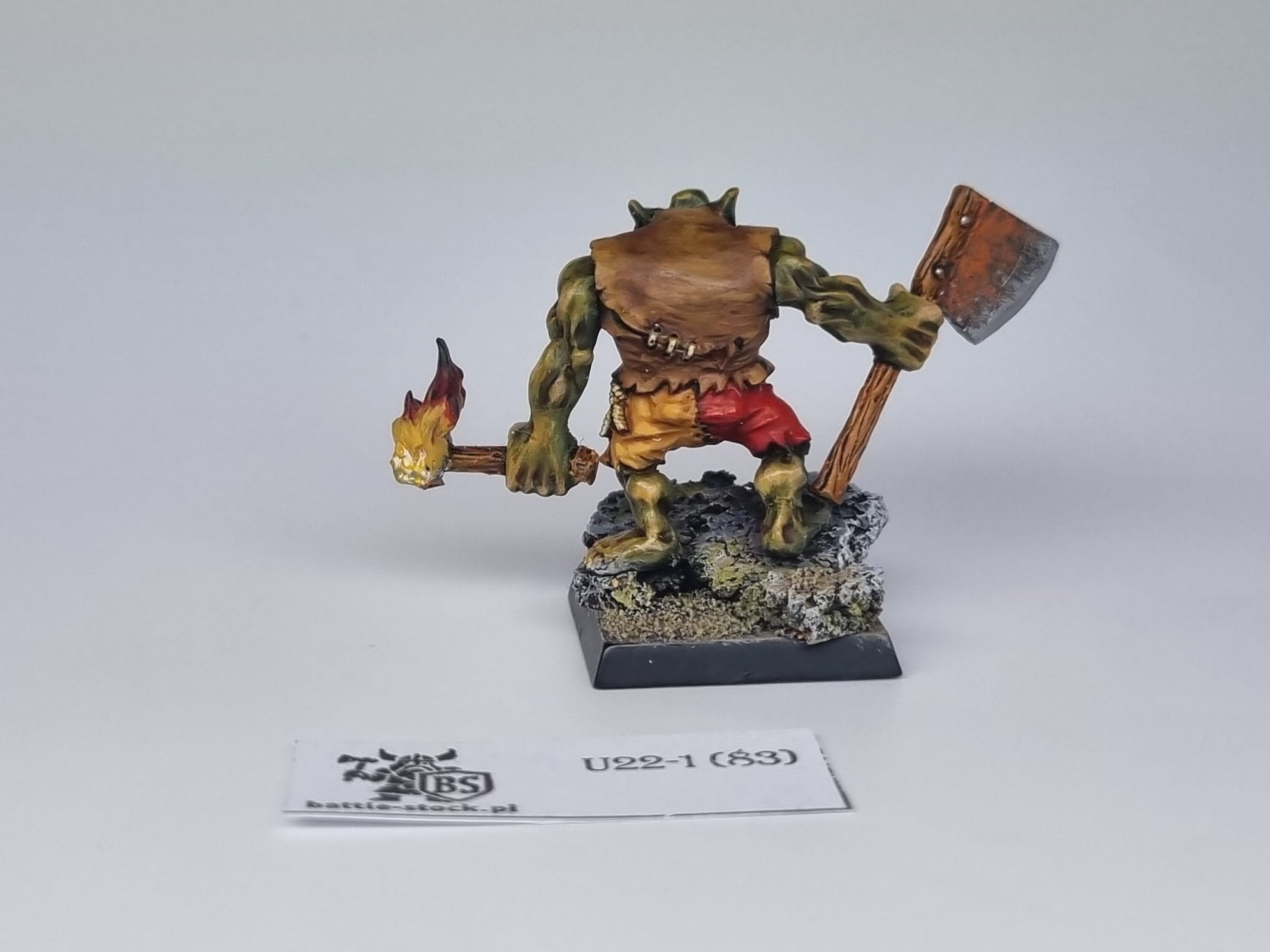 spellcrow orc with axe and torch