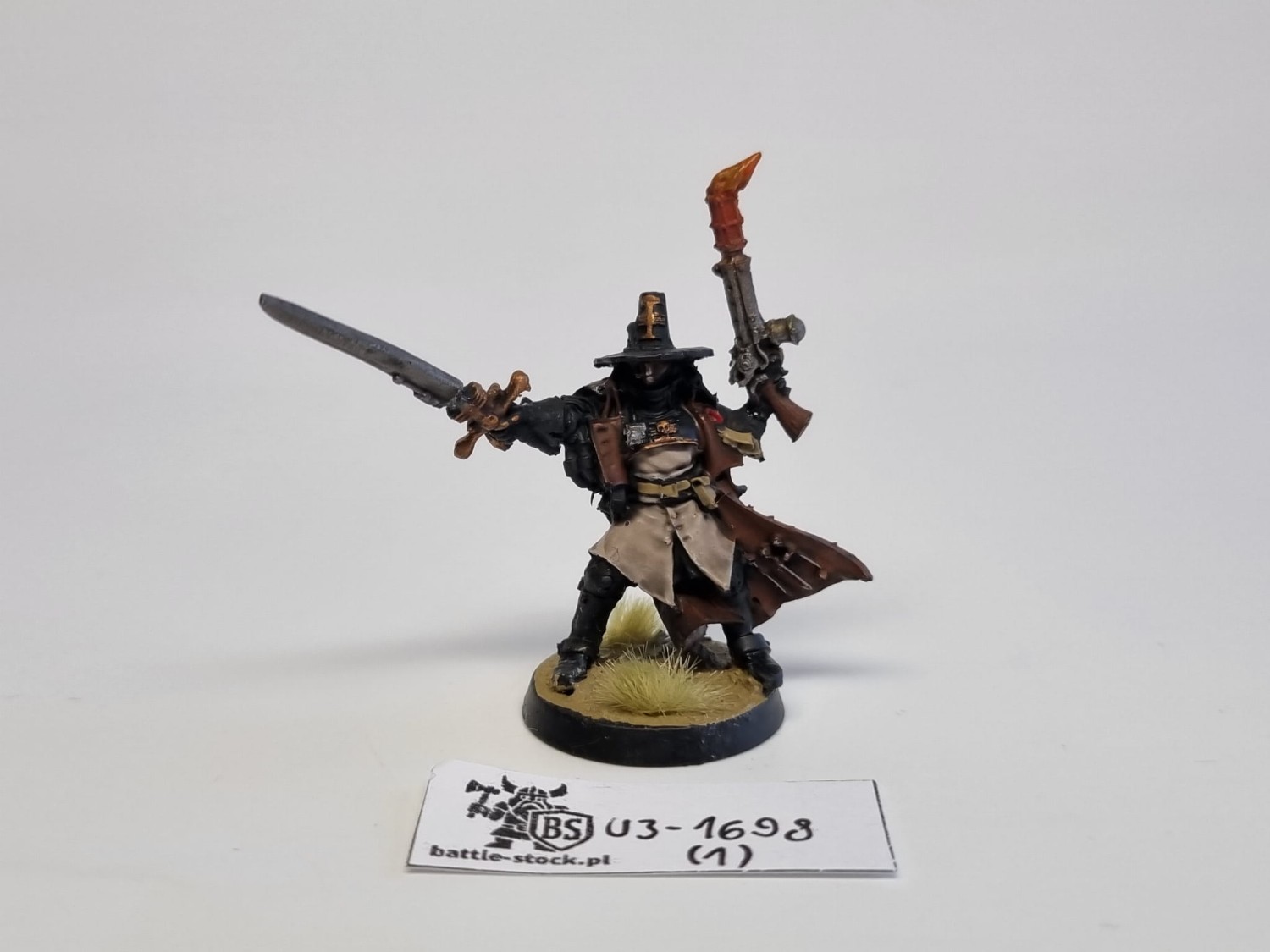 Inquisitor with inferno pistol and power sword finecast
