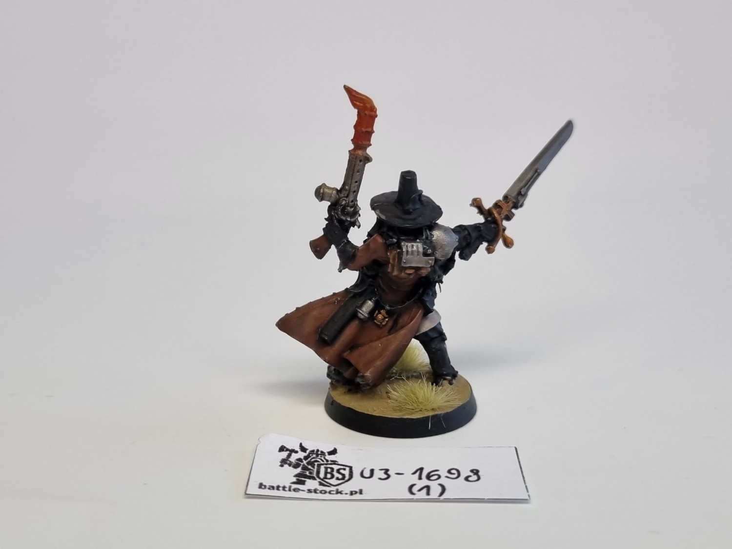 Inquisitor with inferno pistol and power sword finecast