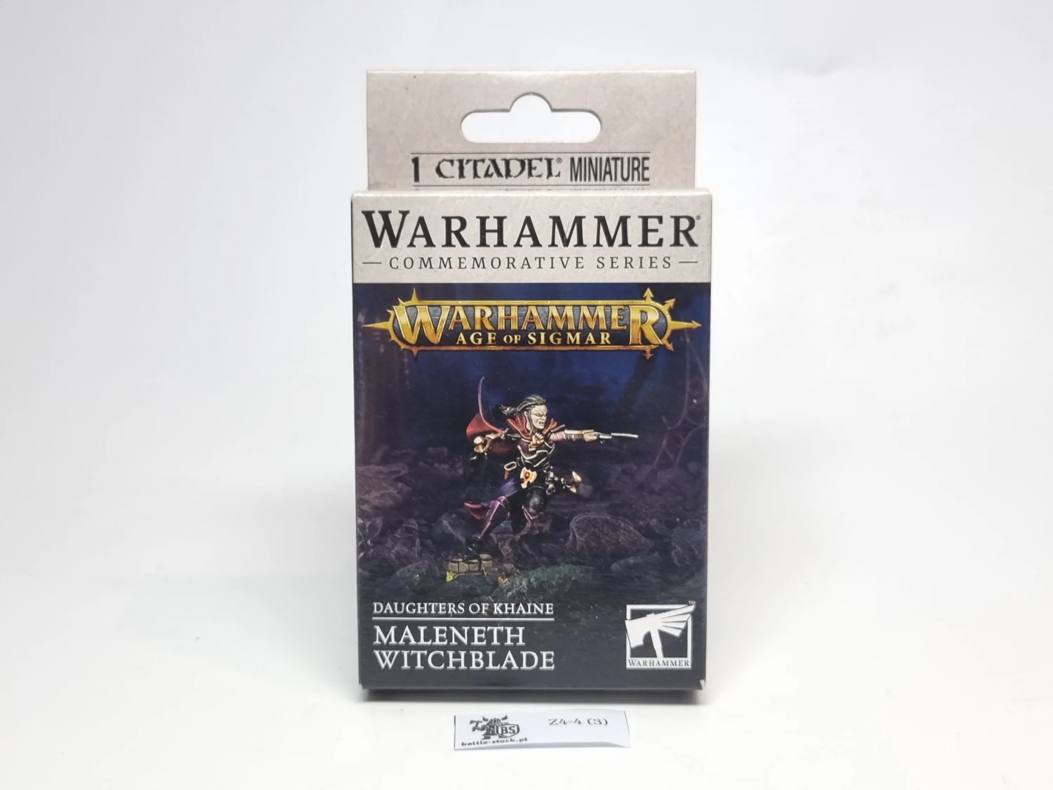 Blister DoK maleneth witchblade na szarym tle z indeksem z przodu.